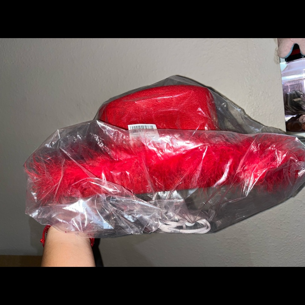 Red feather cowgirl hat